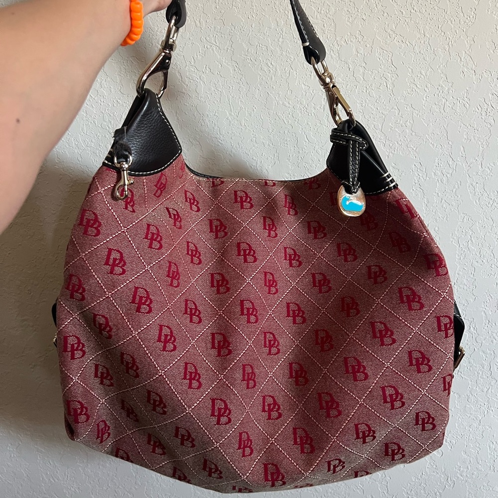Red Dooney & Bourke purse. Black with silver hardware. Slouchy, Y2k look.